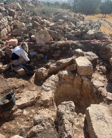 Boyd digging at the Abdoun Archeology Project site, where ACOR archaeologists uncovered a Byzantine wine press