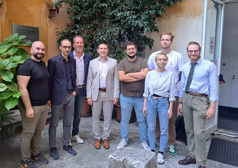 Gary Uzonyi in Genoa, Italy, with doctoral students from the University of Genoa