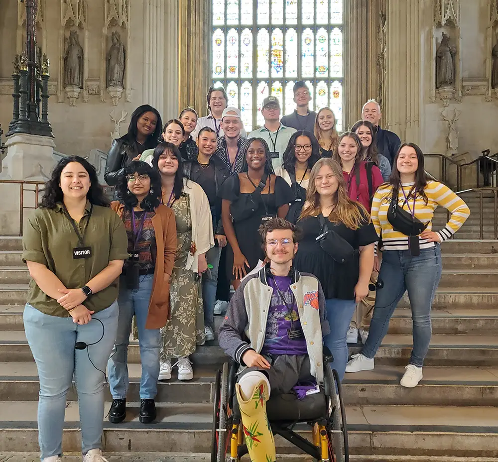 UT students pose on the steps leading up to Westminster Abbey.
